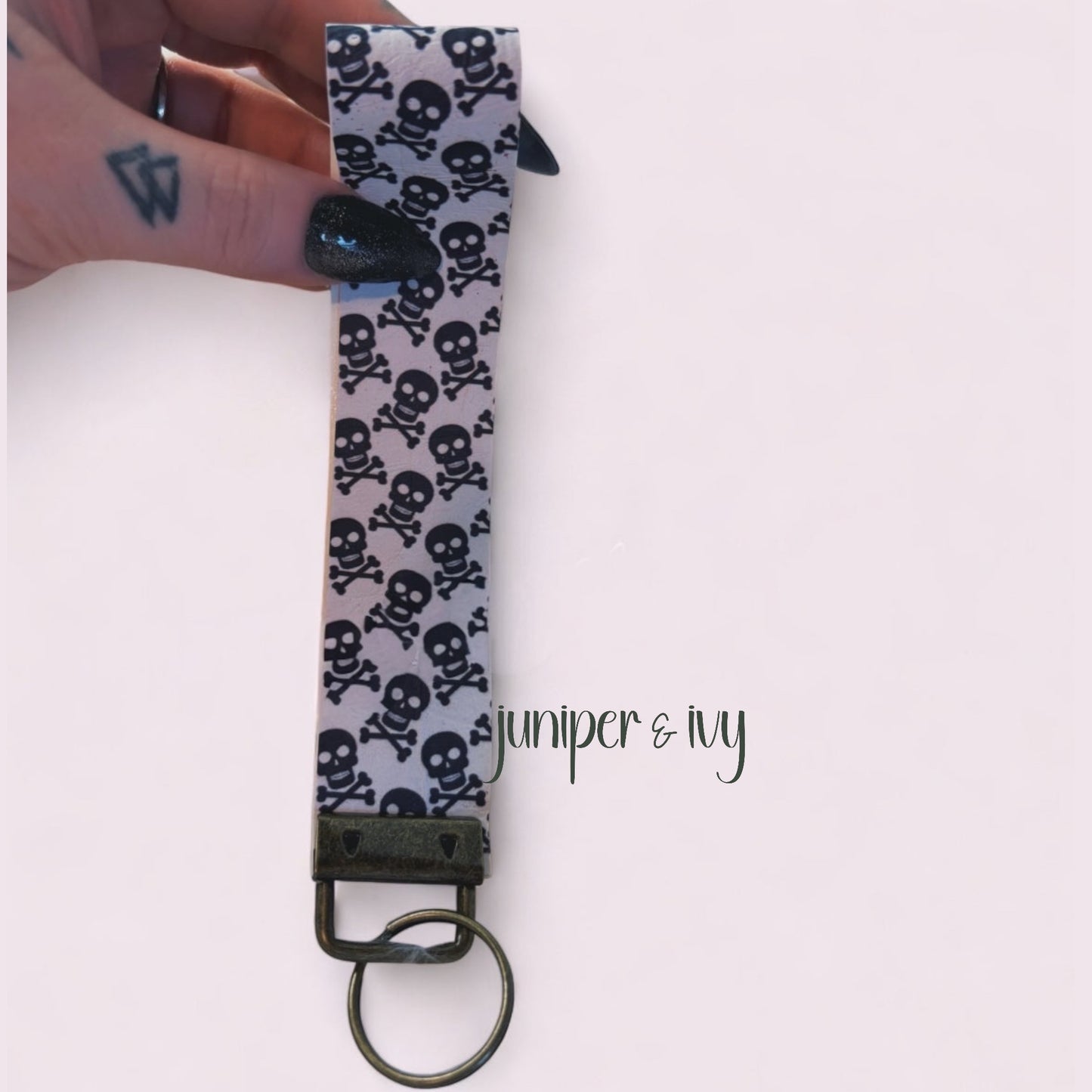 Skulls faux leather wristlet