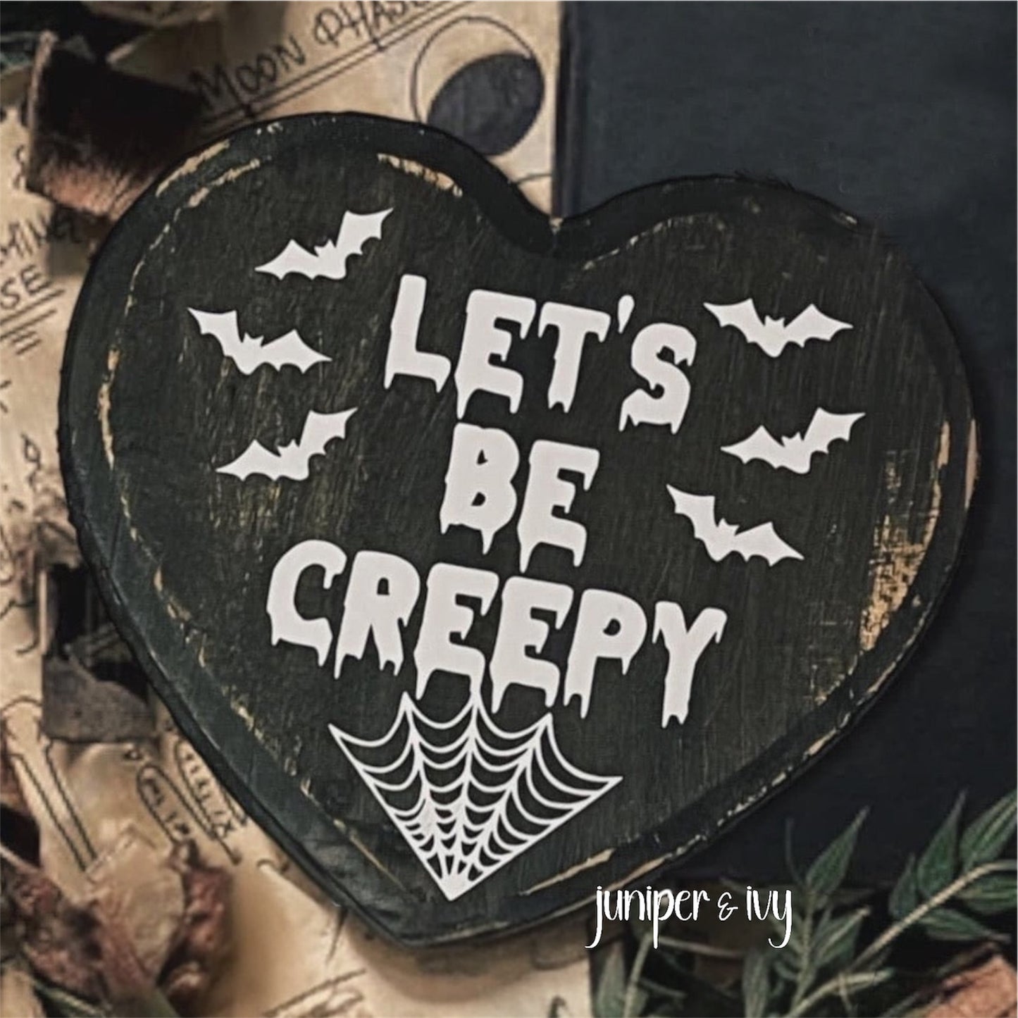 Let’s be creepy wooden sign
