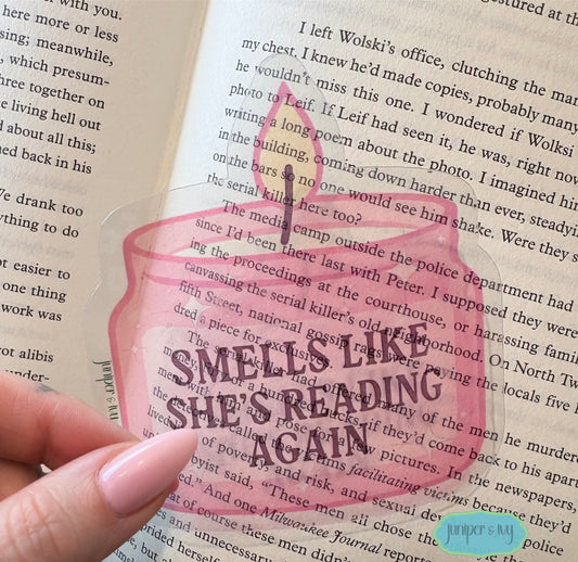 Smells like she’s reading transparent bookmark