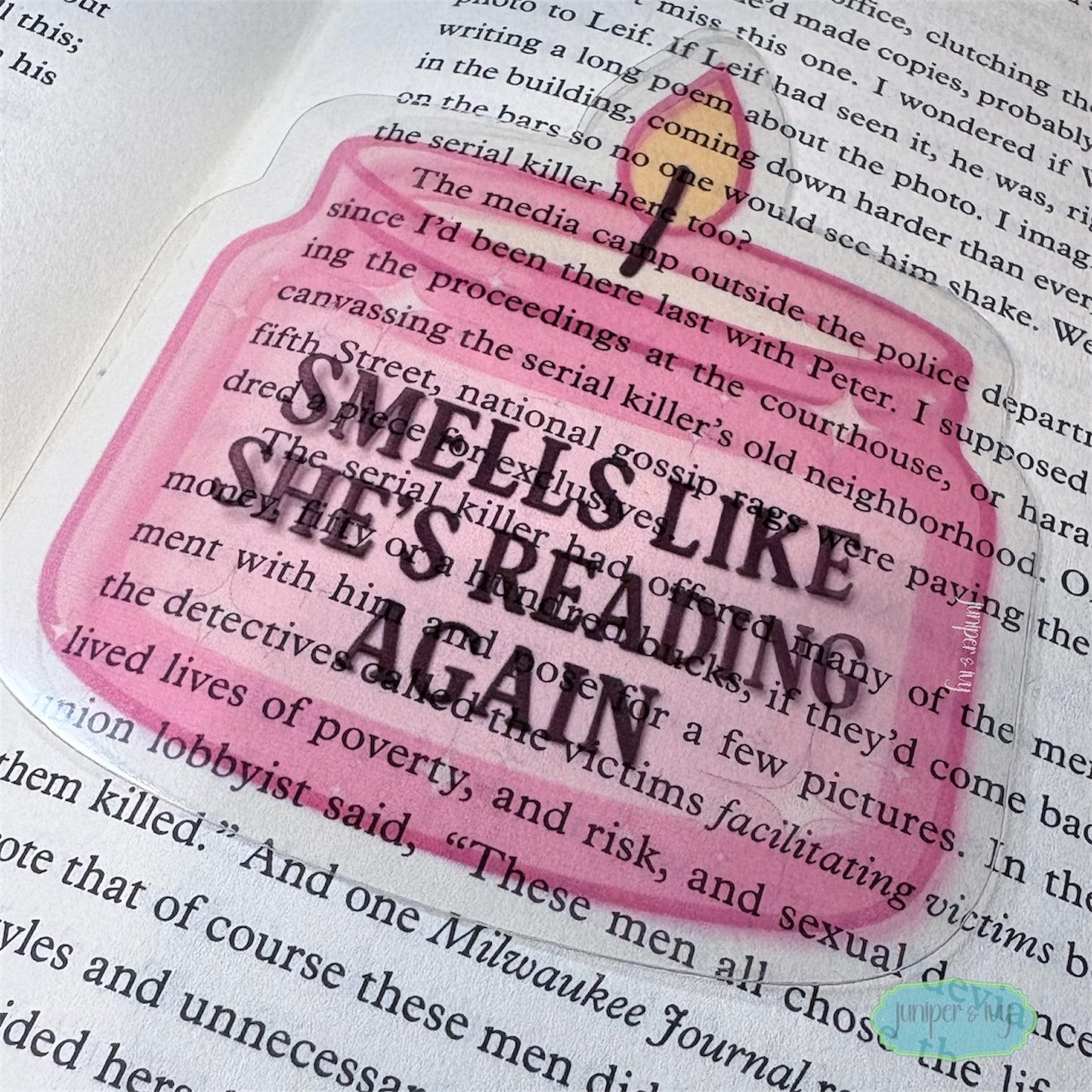 Smells like she’s reading transparent bookmark