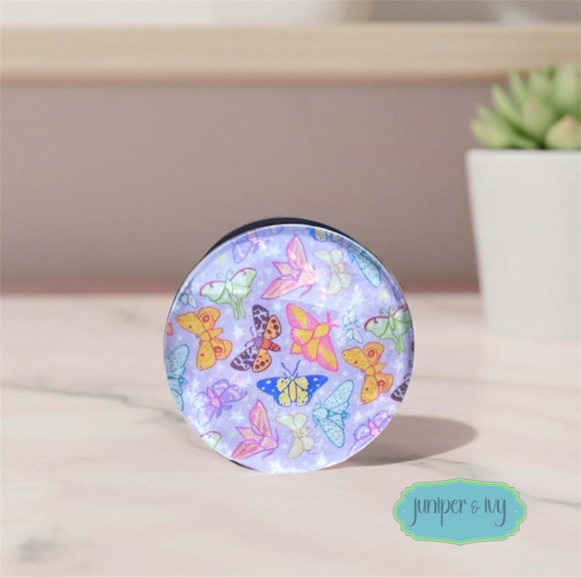 Pastel moth glass dome phone grip