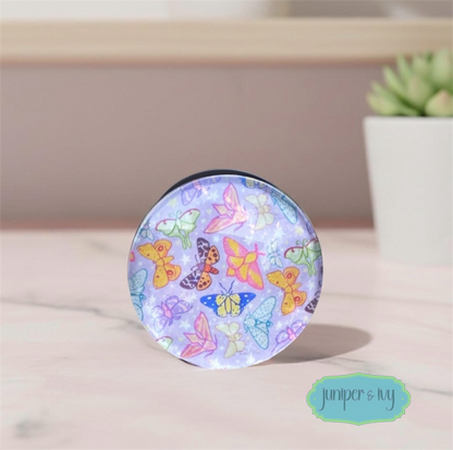 Pastel moth glass dome phone grip