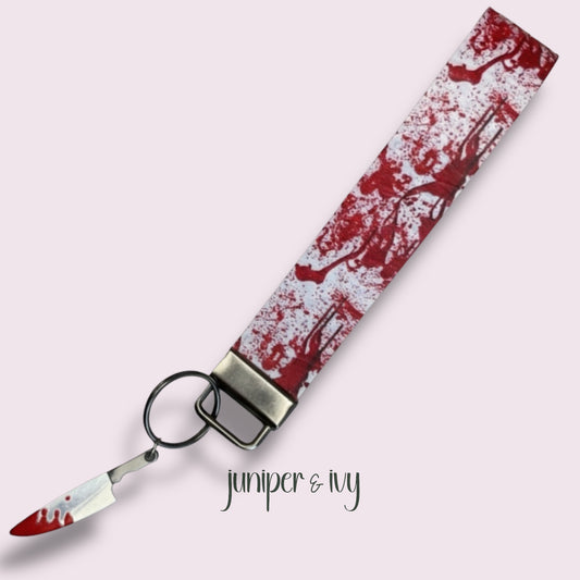 Blood splatter faux leather wristlet