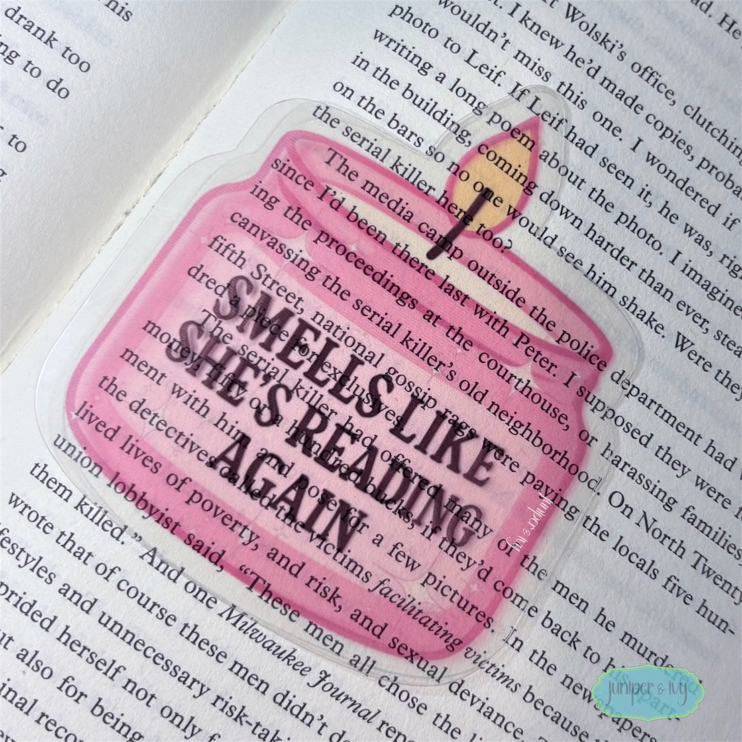Smells like she’s reading transparent bookmark